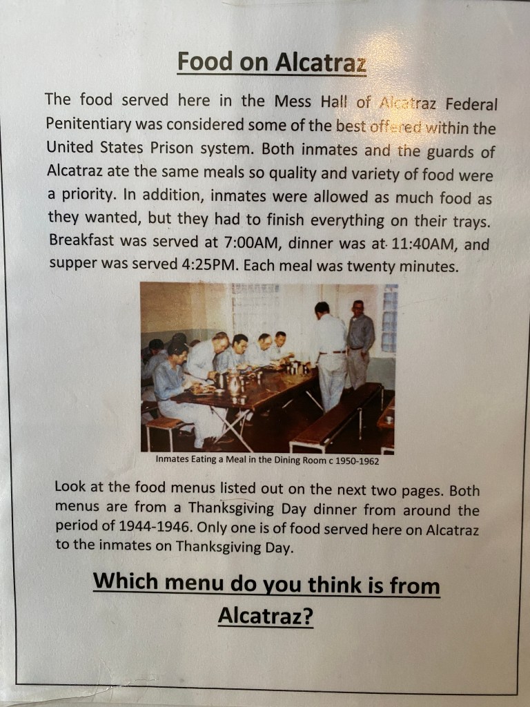 Exhibit text about meals served on Alcatraz and dining room routines.