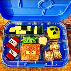 Minecraft Lunch with Piggy block and creeper apple in a blue Yumbox lunchbox for kids