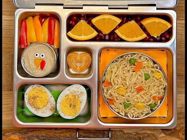 Thanksgiving snack with belle pepper and hummus in a Planetbox kid's lunchbox
