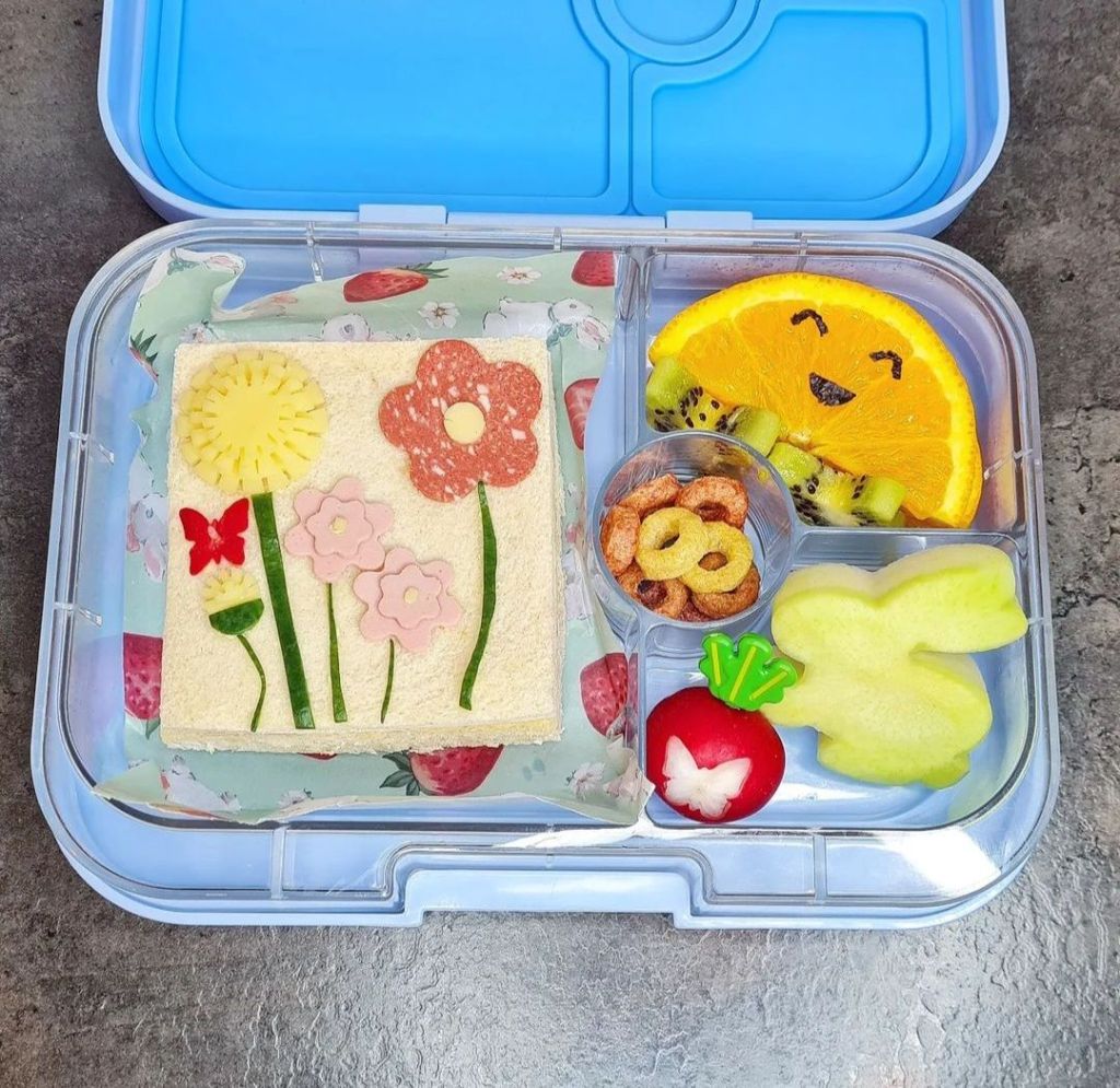 Floral open sandwich that celebrates spring in a joyful and delicious lunchbox for kids