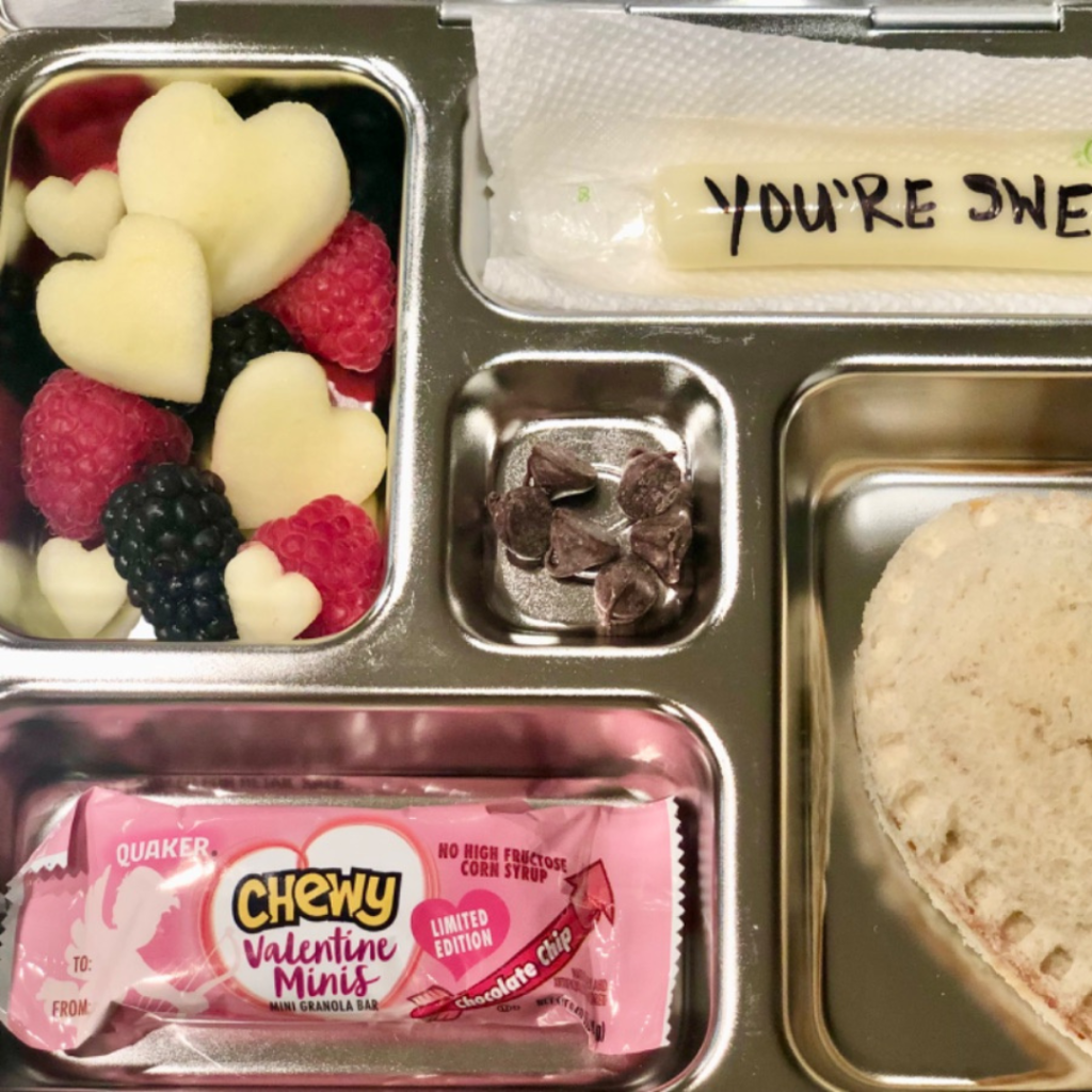 Valentine's Day kids' lunch in a bento lunchbox with Quaker granola bar for snack