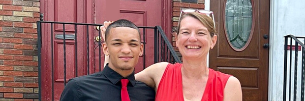 Yvonne Fricker with his son, who inspired her to create Warmables.