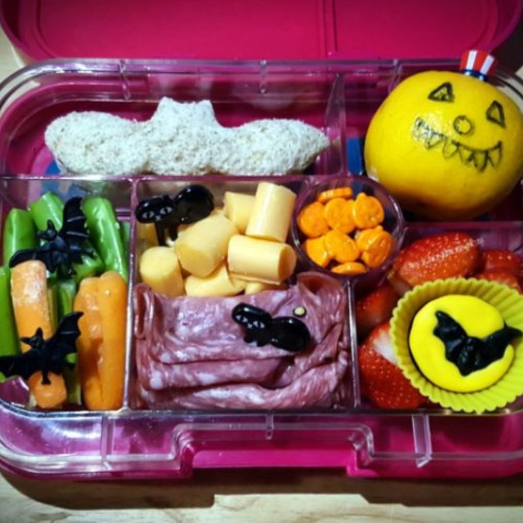 Kids bento lunchbox with back cat food picks for celebrating Halloween