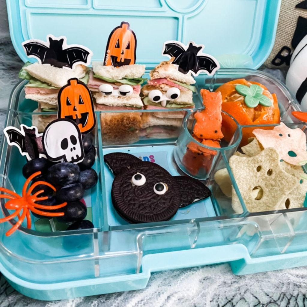 Kid lunchbox ideas with paper food picks celebrating halloween