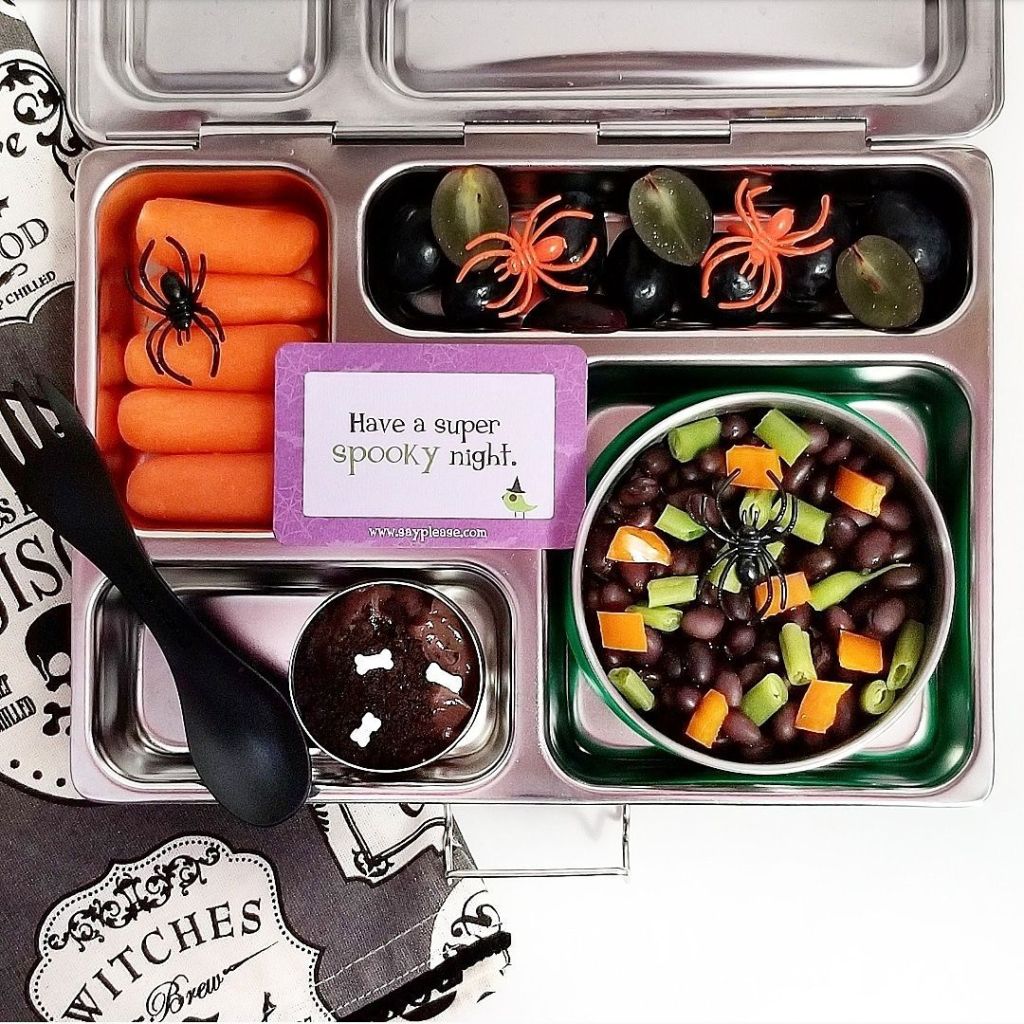A kid lunch box with black cutlery for celebrating halloween