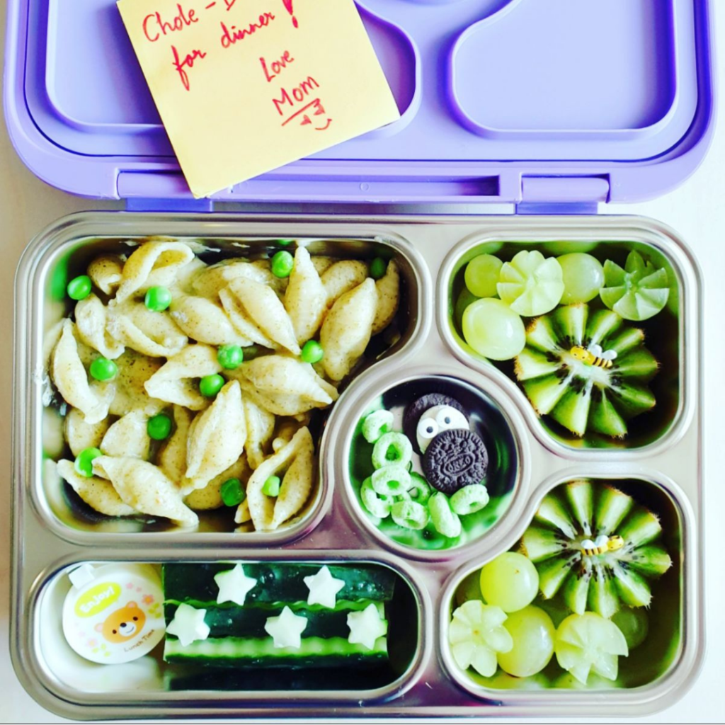 mini Oreo cookies in a super very green lunchbox