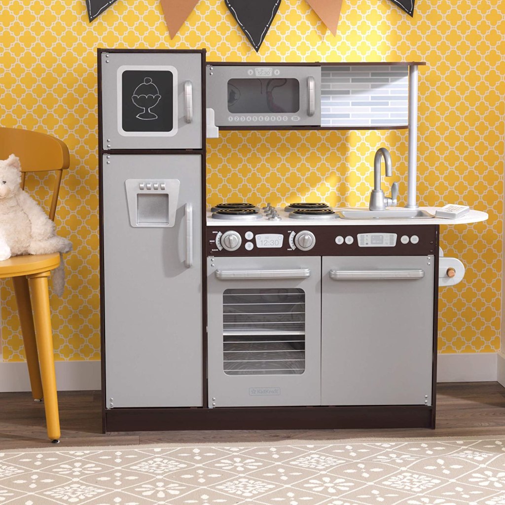 The KidKraft Uptown Espresso Wooden Play Kitchen with Play Phone, Chalkboard & Towel Rack, is an Amazon Exclusive with over 7,000 reviews (including 80% 5-star reviews!) and is on sale! 25% off! Now at $104 instead of $138.49!