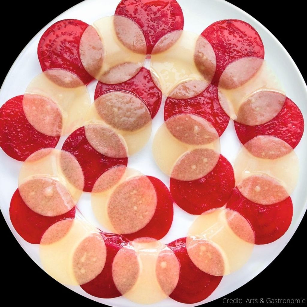 Chef Frédéric Anton played with beets in a minimalist way, associating finely sliced beets with Comté cheese. The result is astonishing as it looks like the topping of a pizza