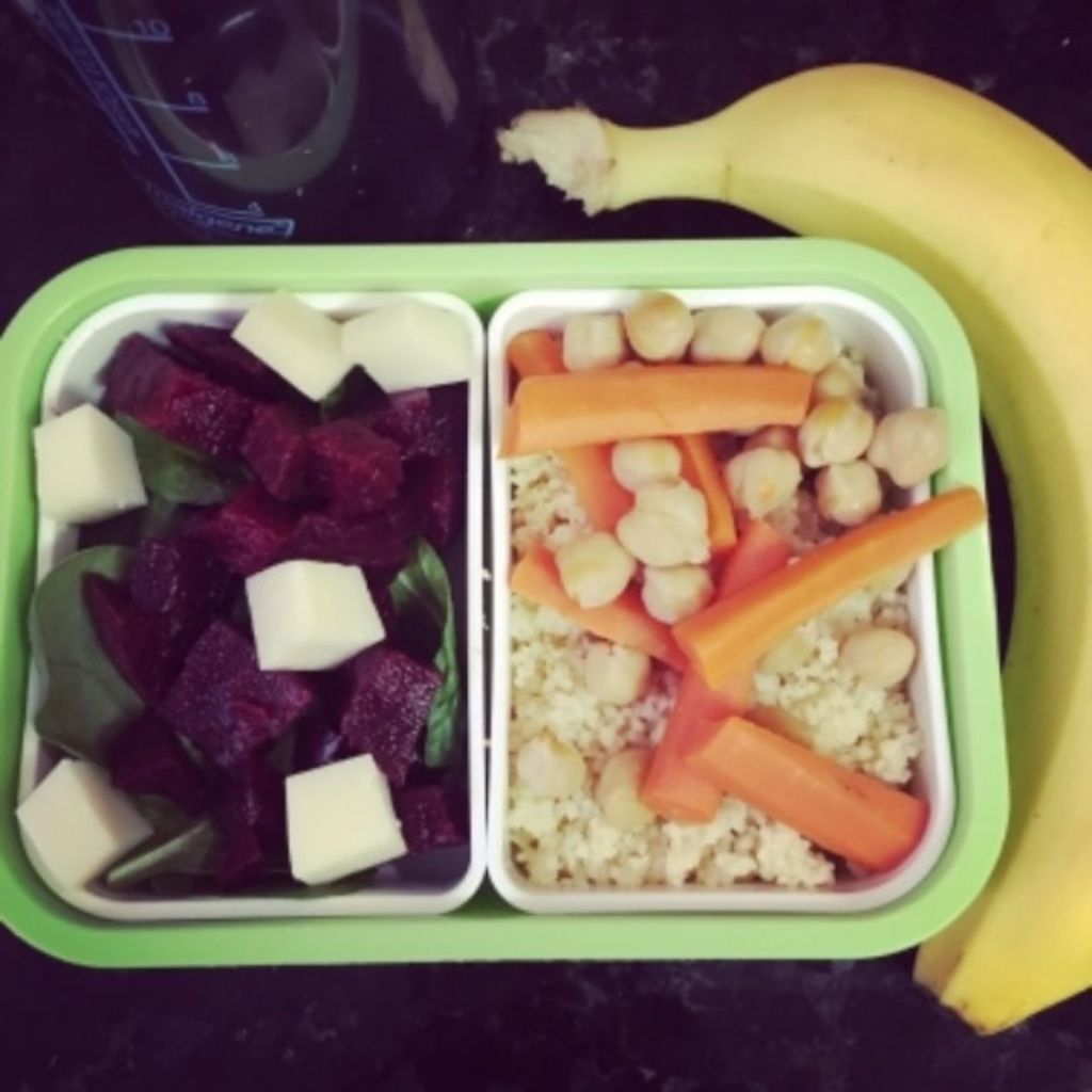 Jessica made a simple but tasty salad for her kid's lunch by associating diced beets with a few fresh spinach leaves and diced gruyere.