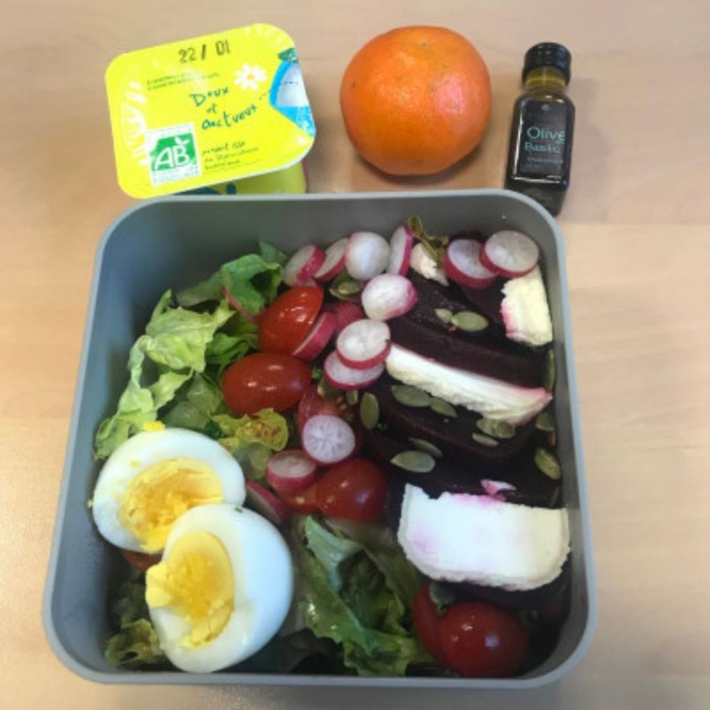Jenna's Dream Salad, with arugula, hard boiled egg, cherry tomatoes, radishes, goat cheese, and... beets!