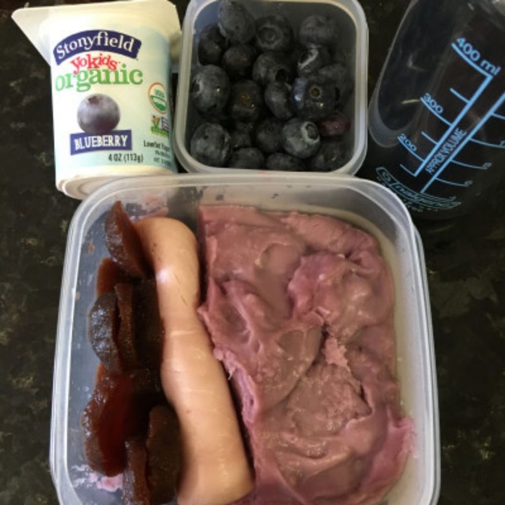 Steve placed slices of cooked beets on the side of the lunch container he prepared for his child, along with ham, and purple sweet potato purée.