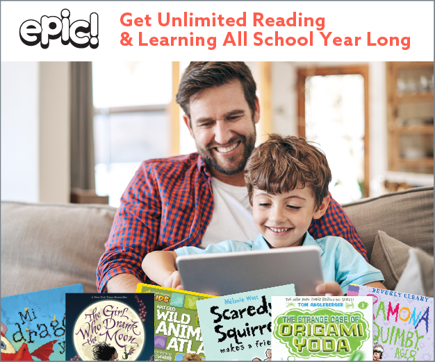 A dad and his son reading on a tablet