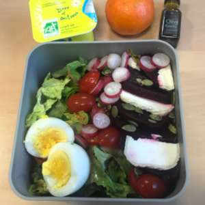 Jenna Bento lunchbox with salad, cherry tomatoes, radishes