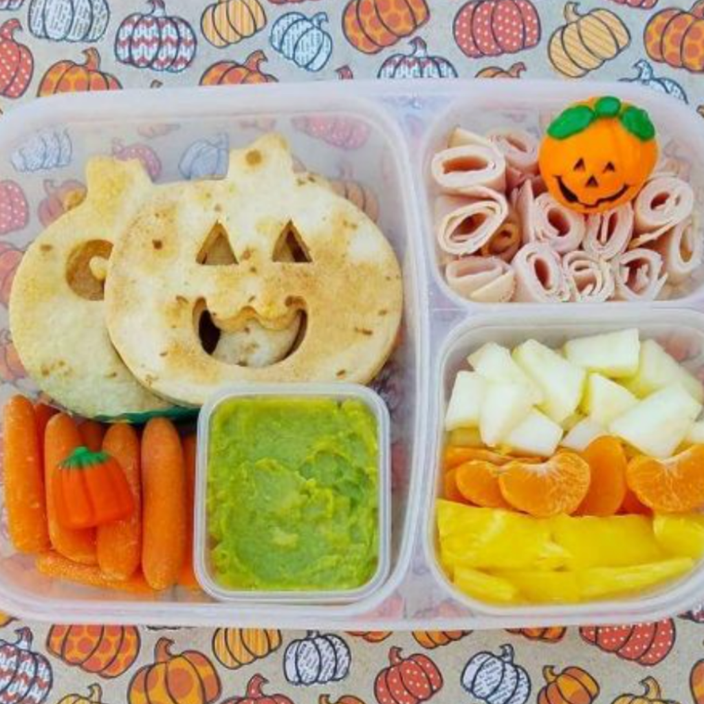 Halloween lunch box idea for kids. Jack-O'-Lantern quesadilla. Teuko Lunchbox Community.