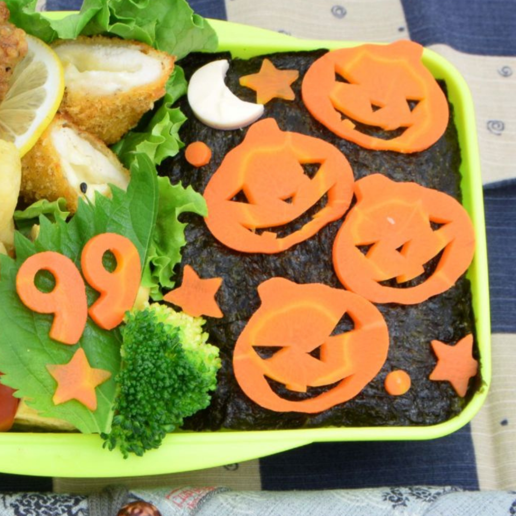 Carved carrots. Jack-O'-Lanterns. Japanese bento. Halloween lunch box idea. Teuko Lunchbox Community.