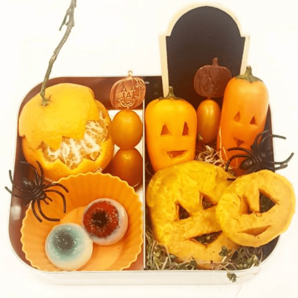 Carved sweet potatoes and bell peppers. jack-O-Lantern. Halloween Lunch box idea for kids. Teuko Lunchbox community.